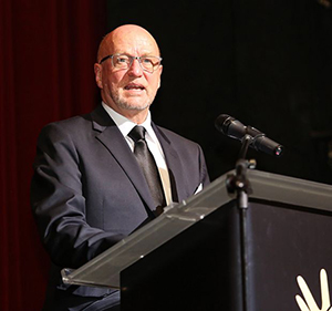 Minister Derek Hanekom speaking at the 2014 Lilizela Awards.